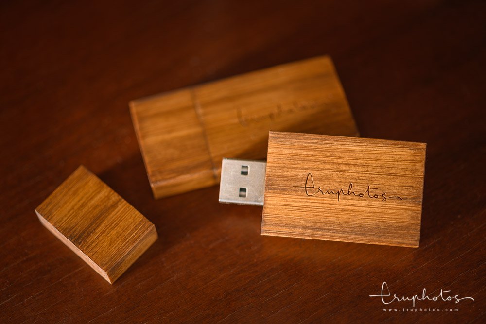 Custom made wooden USB flash drive used to store digital files and delivered to clients.